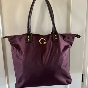 C Wonder Spacious Purple Tote with Gold Emblem and Leather Handles